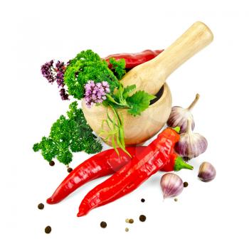 Hot red pepper, garlic, parsley, peppercorns and mustard, mint, tarragon, marjoram in wooden mortar isolated on white background