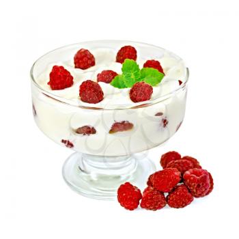 Thick yogurt with raspberries and mint in a glass sundae dish, raspberries isolated on white background
