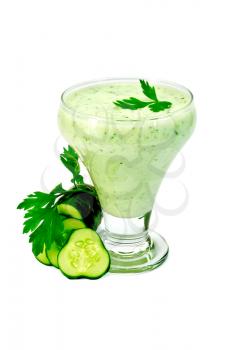 Yogurt in a glass with cucumber, parsley isolated on a white background