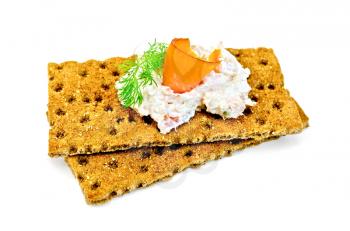 Two rye crispbread with mayonnaise and a slice of salmon, dill isolated on white background