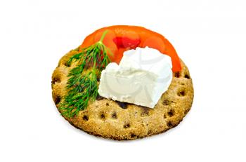 A piece of feta cheese, a slice of tomato, dill on a round rye crispbread isolated on white background