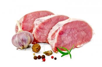Three pork meat slices, rosemary, peppercorns, garlic, nutmeg isolated on white background