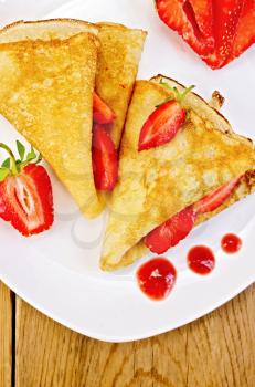 Royalty Free Photo of Crepes on a Plate With Berries