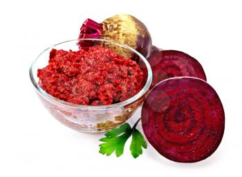 Beet caviar in the glass bowl, beets, parsley isolated on white background