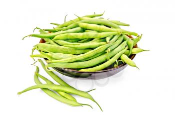 Asparagus green beans in a bowl isolated on white background