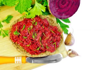 Sandwich with beet caviar and dill, knife, parsley on a wooden board, garlic, beets isolated on white background