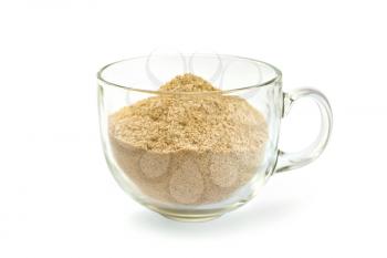 Flour sesame, cedar or oatmeal in a glass cup isolated on white background