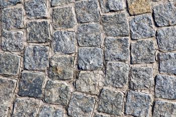 The texture of rough gray granite square tiles