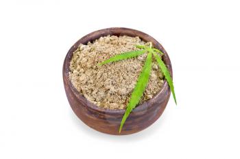 Hemp flour in a clay bowl with cannabis leaf isolated on white background