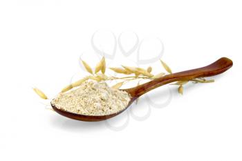 Flour oat in a wooden spoon, stalks of oats isolated on a white background