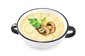 Soup puree with champignons in the bowl isolated on white background