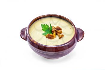 Mushroom soup with chanterelles in a bowl isolated on white background