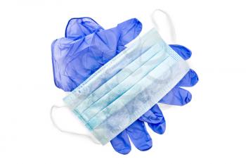 Blue latex gloves and medical disposable mask isolated on white background
