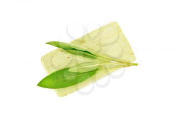 Green soap with sage sprig isolated on white background from above