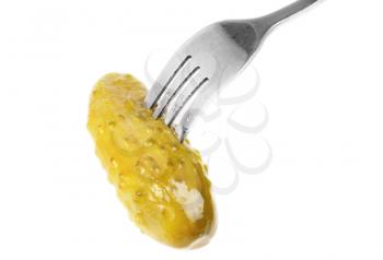 Royalty Free Photo of a Pickle on a Fork