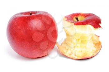 Royalty Free Photo of a Whole Apple and an Eaten Apple