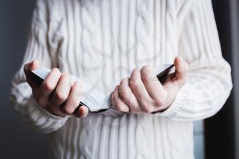 Man reading. Book in his hands.