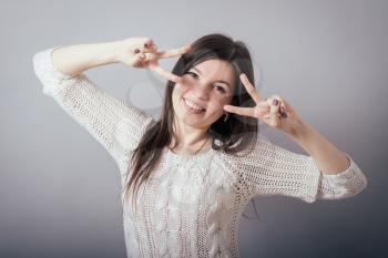 girl showing two fingers