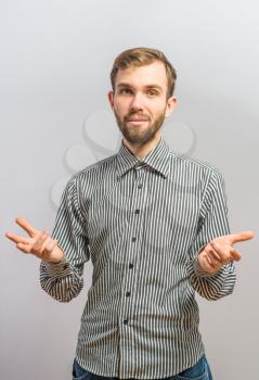 man holding up his hands showing he has nothing