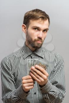 Businessman giving money 
