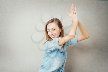 Happy business woman applauding 