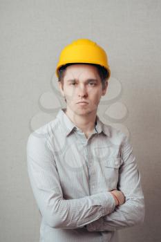 young man in a construction helmet