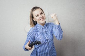 young girl relaxing and playing video games