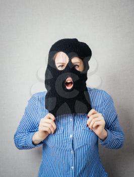  woman wearing balaclava or mask on head 