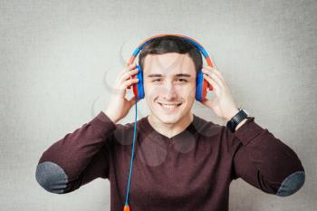 man listening to music on headphones and dancing