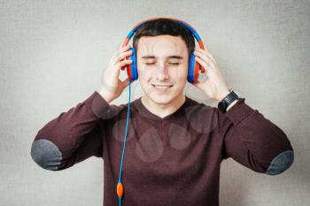 man listening to music on headphones and dancing