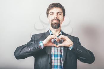 man shows heart hands