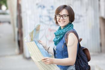 Woman tourist with map