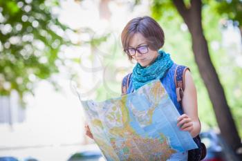 Woman tourist with map