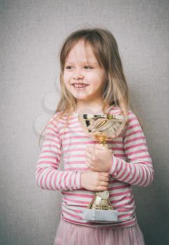 little girl with a cup