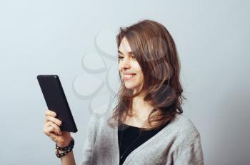 young woman using digital tablet computer
