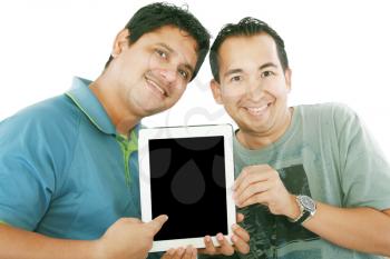 Two young men or businessmen showing a tablet PC computer and smiling 