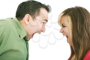Portrait of a man and woman yelling at each other against white background 

