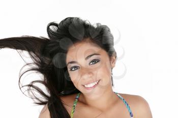 beauty portrait of young brunette woman with hair style laying down on white