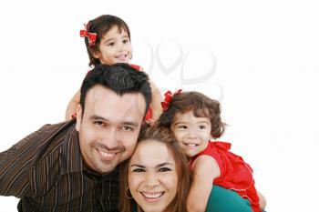 Beautiful family enjoying, mom and dad playing with their daughter