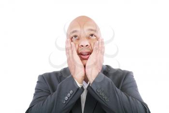 Shocked businessman isolated on a white background. 