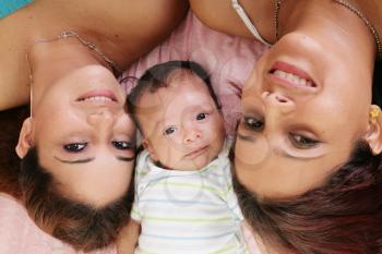 Royalty Free Photo of Two Women With a Baby