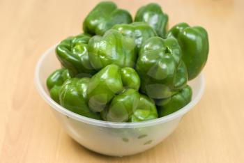 Royalty Free Photo of a Bowl of Green Peppers