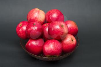 Royalty Free Photo of a Bowl of Pomegranates