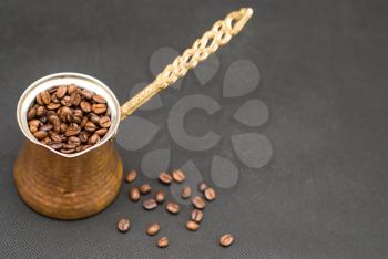 Royalty Free Photo of a Cup of Coffee Beans