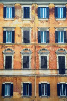 Vintage windows of an old italian building