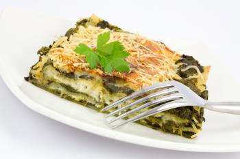 Spinach and goat cheese lasagne, vegetarian food