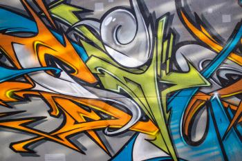 Details of a colorful graffiti on a wall, abstract background