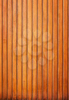 Wooden planks wall vertical background.