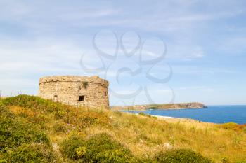 Torre d’en Penjat uncared fort scenery at Menorca, Spain