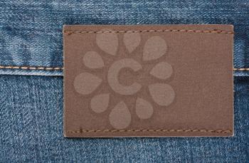 Royalty Free Photo of a Blank Label on Denim Jeans